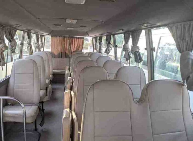 hire seat coaster bus Accra Ghana with apple pay